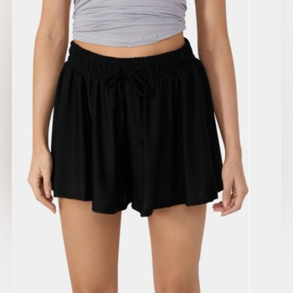 Shorts with mesh overlay